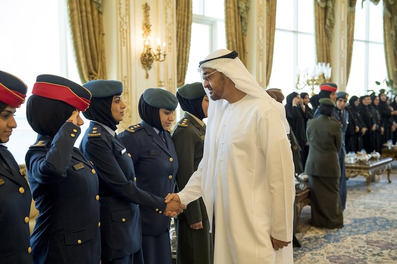 Sheikh Mohammed bin Zayed, Crown Prince of Abu Dhabi and Deputy Supreme Commander of the Armed Forces, greets a member of the Armed Forces on the occasion of Emirati Women’s Day, during a Sea Palace barza.  Rashed Al Mansoori / Crown Prince Court - Abu Dhabi