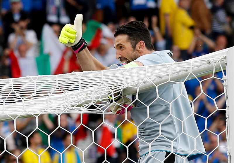 FILE -- In the  June 17, 2016 file photo Italy goalkeeper Gianluigi Buffon celebrates his team's victory at the end of the Euro 2016 Group E soccer match between Italy and Sweden at the Stadium municipal in Toulouse, France. Twenty years after he made his Italy debut on a snowy pitch in a World Cup playoff in Russia, the Azzurri captain's international future hinges on another playoff against Sweden. If Italy advances, Buffon can conclude his Italy career where it started at next year's tournament in Russia. A loss would almost certainly mark his final appearance for the national team. (AP Photo/Andrew Medichini)