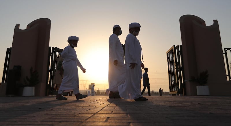 Muslims leave the Eid musallah in Nad Al Hammar, Dubai, after prayers. EPA