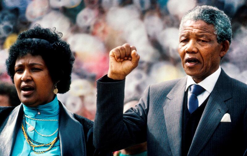 epa02016900 (FILE) A file picture dated 13 February 1990 of Former South African President Nelson Mandela (R) giving the clenched fist salute as he stands with his wife Winnie Mandela (L) during his 'Welcome Home Rally' in Soweto, South Africa. Thursday 11 February 2010 marks the 20th anniversary of Nelson MandelaÕs release from prison. On 11 February 1990 a dignified and determined Nelson Mandela walked out of Victor Verster prison in Cape Town South Africa, a free man for the first time in 27 years. When he arrived at the City Hall a crowd of 50,000 supporters had assembled.  From the balcony he spoke his first words in public for over a quarter century. 'Our struggle has reached a decisive moment. Our march to freedom is irreversible.' The event was broadcast live all over the world. The lawyer and anti-apartheid activist had been convicted of treason and sabotage in June 1964 and sentenced to life imprisonment. He spent most of his sentence on Robben Island, off Cape Town, doing hard labour. During the 1980s he refused many offers for early release from the government because of the conditions attached. However, on 02 February 1990, South African President F.W. de Klerk reversed - after long negotiations with Mandela - the ban on the ANC and other anti-apartheid organisations, and announced that Mandela would be released. This was the beginning of the opening up of apartheid-era South Africa where blacks had been severely discriminated against. In the first national elections in which blacks had the right to vote the ANC won and Mandela became President.  He remained in that office from 1994 to 1999. The Opening of Parliament this year has been scheduled to coincide with the 20th anniversary of Mandela's release and South African President Jacob Zuma will honour him in his State of the Nation address.  EPA/STR *** Local Caption ***  02016900.jpg