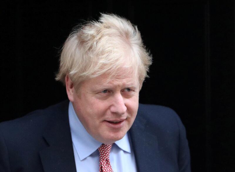 FILE PHOTO: Britain's Prime Minister Boris Johnson leaves Downing Street, as the spread of coronavirus disease (COVID-19) continues. London, Britain, March 25, 2020. REUTERS/Hannah Mckay/File Photo