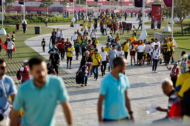 Fans arrive at the Al Bayt Stadium before the opening ceremony of the Qatar World Cup begins. Reuters