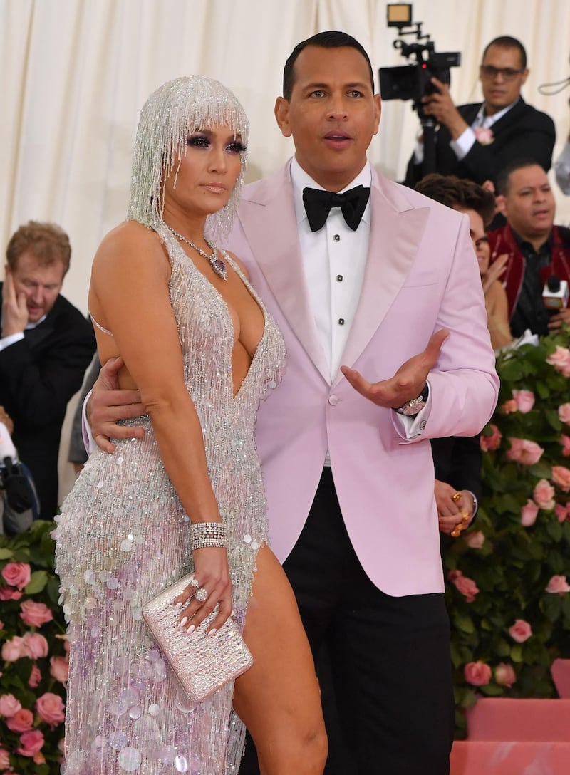 While Singer Jennifer Lopez looked ridiculous in 'look at me' silver, we should all take time to savour the delicate shade of lilac of Alex Rodriguez tuxedo. AFP