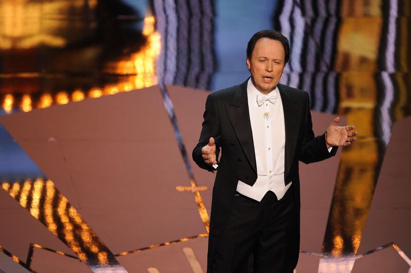Actor Billy Crystal hosts onstage the ceremony of the 84th Annual Academy Awards on February 26, 2012 in Hollywood, California. AFP PHOTO Robyn BECK
