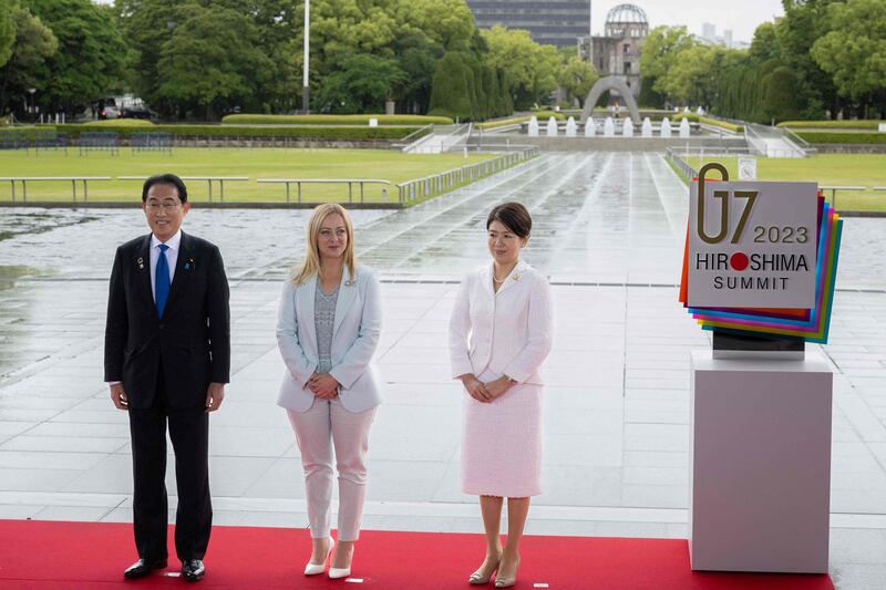 Japan's Prime Minister Fumio Kishida and his wife Yuko, right, with Italy's Prime Minister Giorgia Meloni at the Peace Memorial Park in Hiroshima. AFP