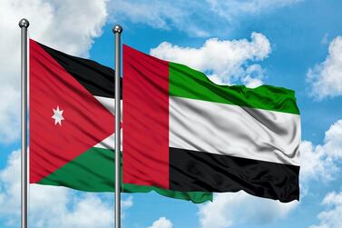 The Jordanian and UAE flags. Alamy