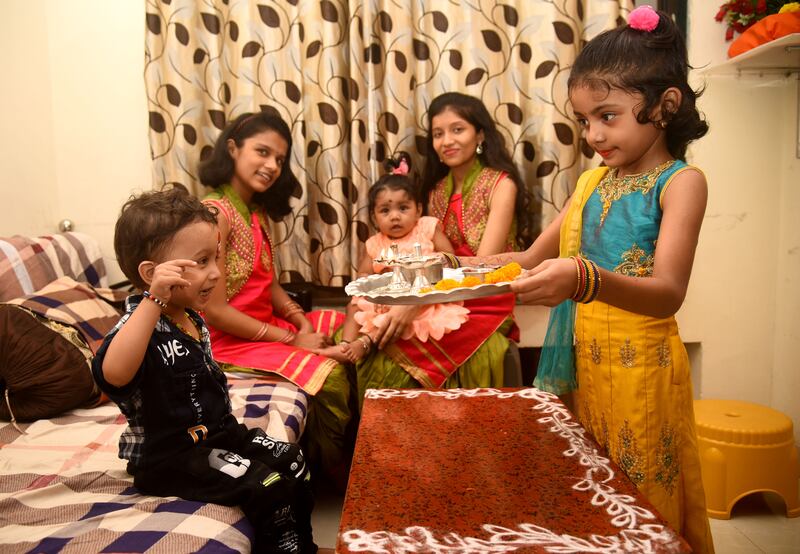 Children celebrate with sweets. Getty Images