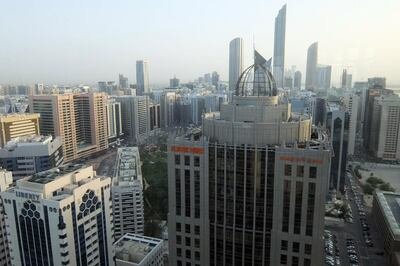 The UAE is set to introduce VAT in January. Pictured, the Abu Dhabi skyline. Delores Johnson / The National