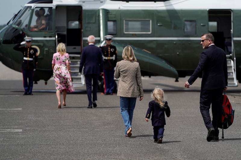 Hunter Biden, his wife Melissa Cohen and their son Beau follow the presidential couple as they board Marine One at Joint Base Charleston, South Carolina. Reuters