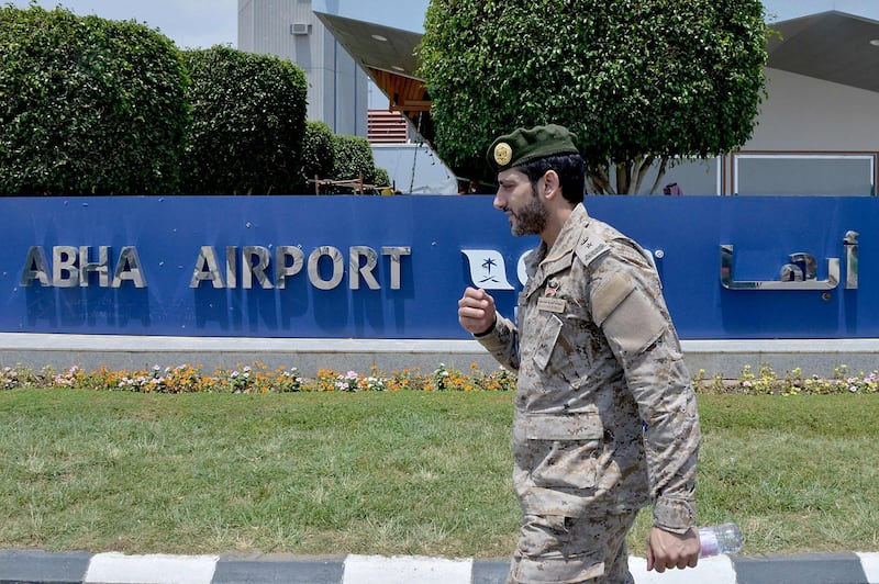 (FILES) This file photo taken taken during a guided tour with the Saudi military on June 13, 2019 shows the welcoming sign at Abha Airport in the popular mountain resort of the same name in the southwest of Saudi Arabia. A Yemeni rebel attack on a civilian airport in southern Saudi Arabia killed a Syrian national and wounded seven civilians on June 23, 2019, a Riyadh-led coalition said, the latest in a series of strikes on the site.
 / AFP / Fayez Nureldine
