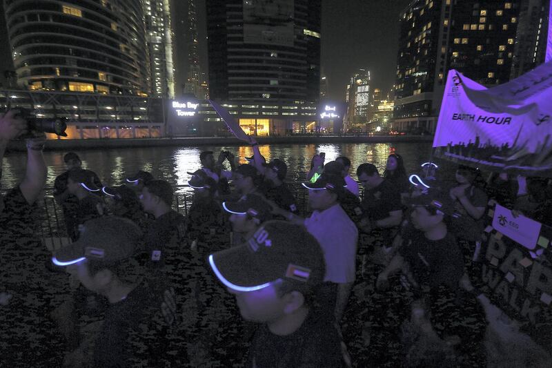 Dubai, March 24, 2018: Dubai residents participate in the Earth Hour Walk at the Marasi promenade in Dubai. Satish Kumar for the National