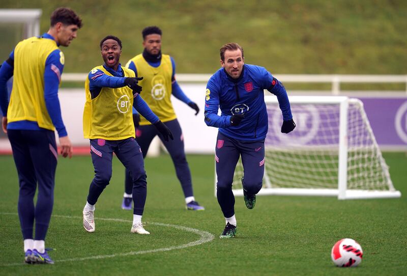 Harry Kane, right, and Raheem Sterling train for England's World Cup qualifier against Albania at St George's Park. PA