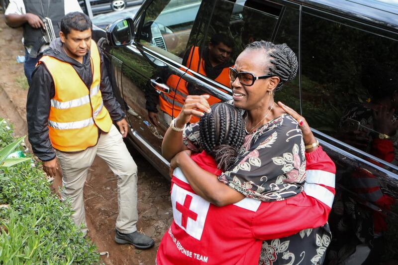 A Kenyan woman (R) is overwhelmed by emotions after receiving the news that her relative (not pictured) was rescued from a business complex in Nairobi, Kenya, a day after suspected militants stormed an upscale hotel and office complex killing several people. The attack has been claimed by Somalia's Islamist militant group al-Shabab. Interior minister Fred Matiang'i said late 15 January that security forces have secured all the buildings without giving further details. According to media reports, at least 15 people have been killed, but no official number has been so far confirmed by the government.  EPA