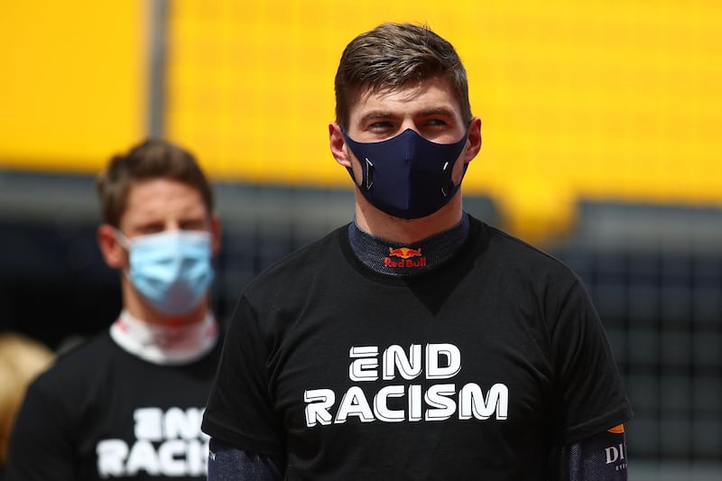 Max Verstappen takes part in an anti-racism protest in support of the Black Lives Matter movement before the Styrian Grand Prix. AFP