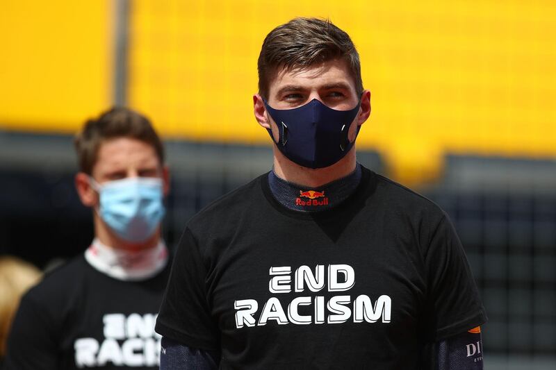 Max Verstappen takes part in an anti-racism protest in support of the Black Lives Matter movement before the Styrian Grand Prix. AFP