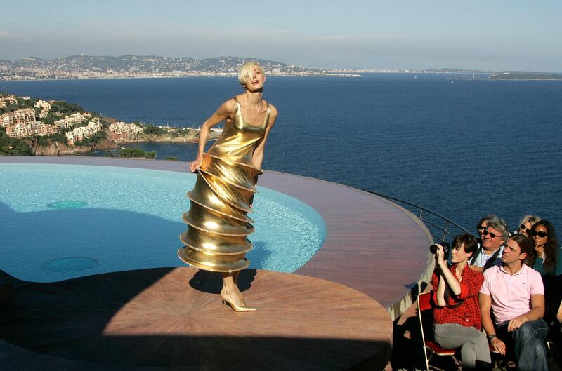 A model wears a spring / summer 2009 design by  Pierre Cardin. The show took place at his villa in Theoule sur Mer in France, called Palais Bulles (House of Bubbles) on October 6, 2008. AP