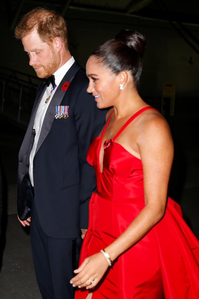 The couple wore poppy pins to park UK Remembrance Day on November 11. Reuters