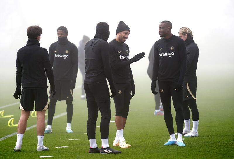 Chelsea's Pierre-Emerick Aubameyang jokes with teammates during training. PA
