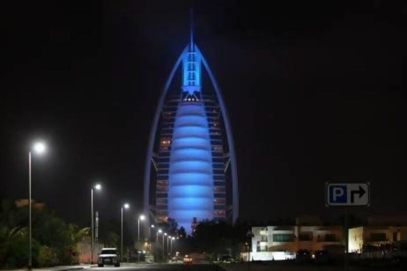 The Burj Al Arab in Dubai is illuminated with blue lights as part of Global Autism Awareness Day. Pawan Singh / The National