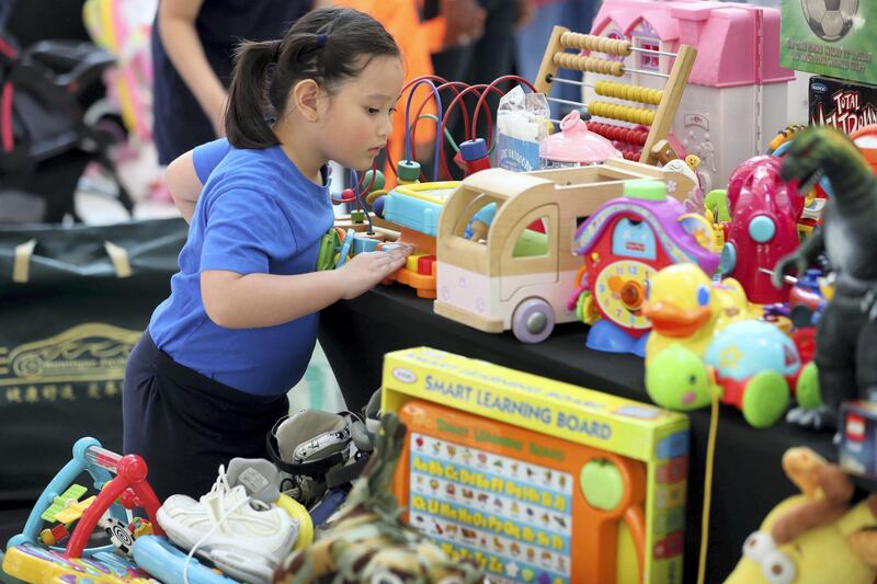 Dubai, United Arab Emirates - November 17, 2018: Shoppers and sellers come to Baby Bazaar to buy and sell baby and children's items. Saturday the 17th of November 2018 at Burjuman Mall, Dubai. Chris Whiteoak / The National