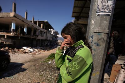 A girl stands in the quake-hit city of Antakya, southern Turkey. AP