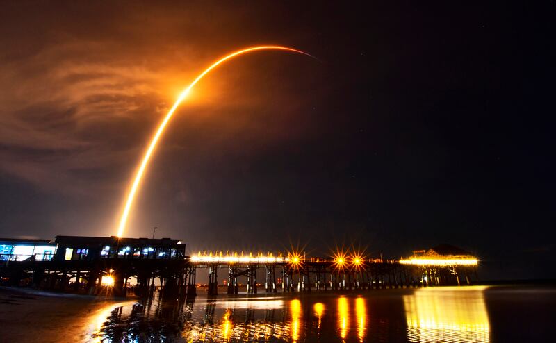 A SpaceX Falcon 9 rocket is pictured from Cocoa Beach as it launches from Launch Complex 40 at Cape Canaveral Space Force Station in Florida.  AP