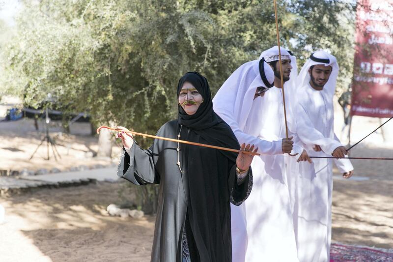 ABU DHABI, UNITED ARAB EMIRATES - DEC 6, 2017

A woman joins in the ayalla performers at the fourth International Festival of Falconry. 

This gathering is a tribute to a similar meeting 41 years ago, in 1976, when the UAE Founding Father Sheikh Zayed invited falconers from around the world to convene in the desert of Abu Dhabi and build a strategy for the sport’s development.

(Photo by Reem Mohammed/The National)

Reporter: Anna Zacharias
Section: NA