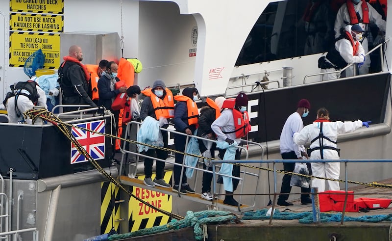 A group of people thought to be migrants are brought in to Ramsgate, Kent, by Border Force officers, following a small boat incident in the Channel. PA