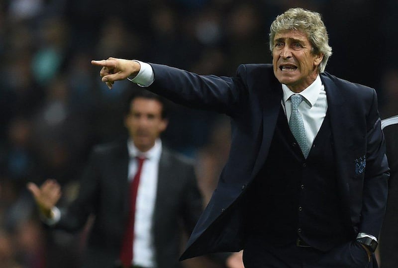Manchester City manager Manuel Pellegrini gestures during a Uefa Champions league Group D football match between Manchester City and Sevilla at the Etihad Stadium in Manchester, north west England on October 21, 2015. AFP PHOTO / PAUL ELLIS