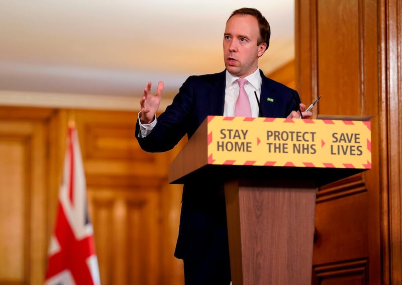 A handout image released by 10 Downing Street, shows Britain's Health Secretary Matt Hancock speaking during a remote press conference to update the nation on the Covid-19 pandemic, inside 10 Downing Street in central London on April 15, 2020. The British government was under pressure Wednesday to set out its plans to end the coronavirus lockdown, as the country's death toll approached 13,000. Figures announced by the health ministry on Wednesday showed that 12,868 people have died from the coronavirus, a rise of 761 over the previous day.
 - RESTRICTED TO EDITORIAL USE - MANDATORY CREDIT "AFP PHOTO / 10 DOWNING STREET / ANDREW PARSONS " - NO MARKETING - NO ADVERTISING CAMPAIGNS - DISTRIBUTED AS A SERVICE TO CLIENTS
 / AFP / 10 Downing Street / Andrew PARSONS / RESTRICTED TO EDITORIAL USE - MANDATORY CREDIT "AFP PHOTO / 10 DOWNING STREET / ANDREW PARSONS " - NO MARKETING - NO ADVERTISING CAMPAIGNS - DISTRIBUTED AS A SERVICE TO CLIENTS
