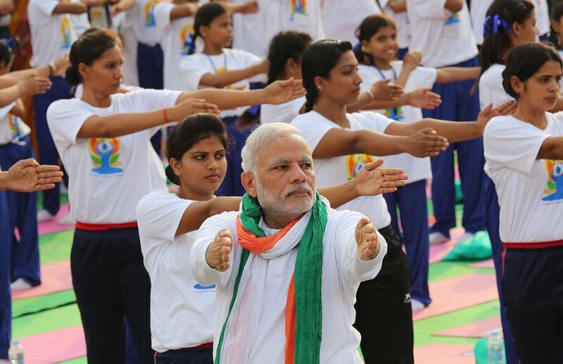 Indian Prime Minster Narendra Modi performs yoga in New Delhi, where Naftali Bennett was scheduled to visit but cancelled when he contracted Covid-19. EPA