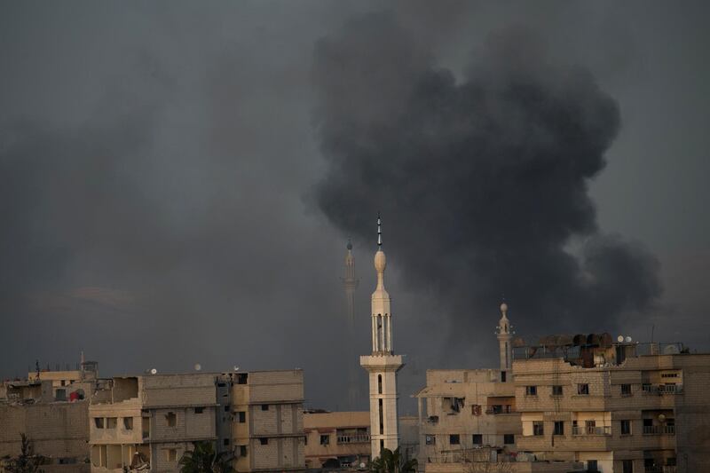 Smoke billows following Syrian government bombardments on the besieged rebel-held town of Hamouria in the eastern Ghouta region on the outskirts of the capital Damascus on March 3, 2018. Abdulmonam Eassa / AFP