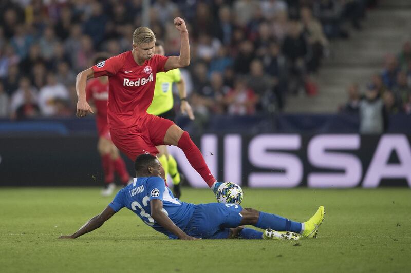 Erling Haaland of FC Salzburg and Jhon Lucumi of KRC Genk during the Champions League group E match. Getty Images