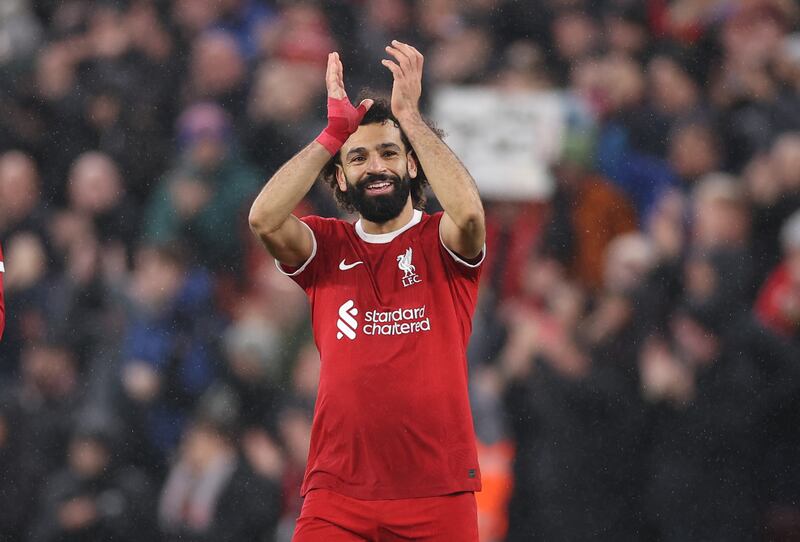 Mohamed Salah applauds the Liverpool fans after the 4-2 Premier League win over Newcastle United at Anfield, Liverpool on January 1, 2024. EPA
