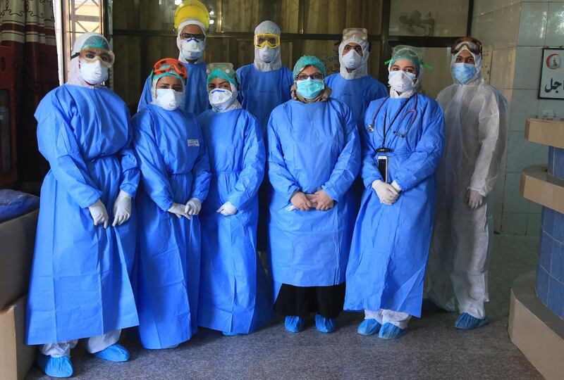 Iraqi health workers at a hospital in the central Iraqi city of Karbala. AFP