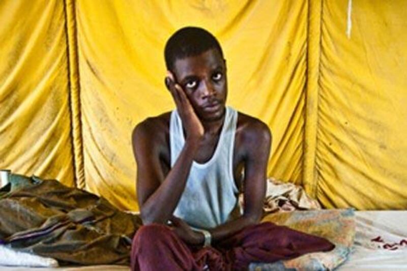 Ismail Mohamed Ishaaq, 21, lost a leg fighting security forces in Mogadishu. He is recovering in a government hospital.
