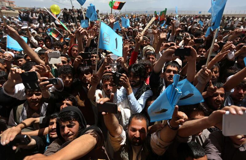 Supporters of Afghan presidential candidate Abdullah Abdullah attend his election campaign gathering in Paktiya province on May 24. The second round presidential election will be held on June 14. Omar Sobhani / Reuters