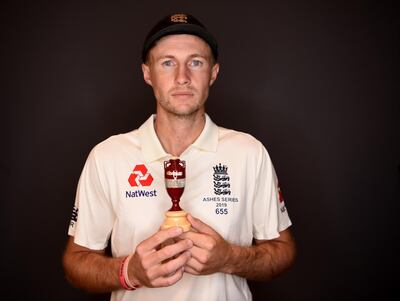 LONDON, ENGLAND - JULY 22: England captain Joe Root holds a replica Ashes urn as he poses for a portrait on July 22, 2019 in London, England. (Photo by Gareth Copley/Getty Images)