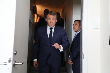 French President Emmanuel Macron arrives at the French delegation office to meet with Palestine President Mahmoud Abbas for a bilateral meeting on the sidelines of the United Nations General Assembly at the UN headquarters on September 23, 2019, in New York. AFP