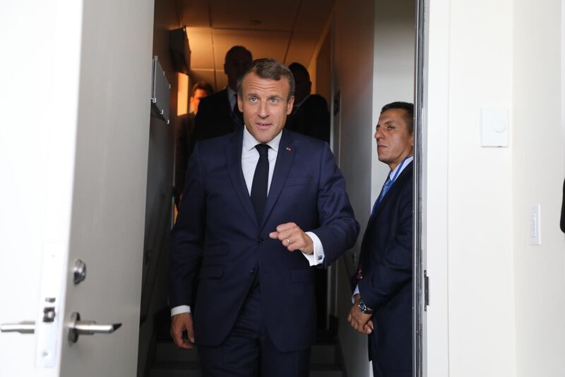 French President Emmanuel Macron arrives at the French delegation office to meet with Palestine President Mahmud Abbas for a bilateral meeting on the sidelines of the United Nations General Assembly at the UN headquarters on September 23, 2019, in New York. / AFP / Ludovic MARIN
