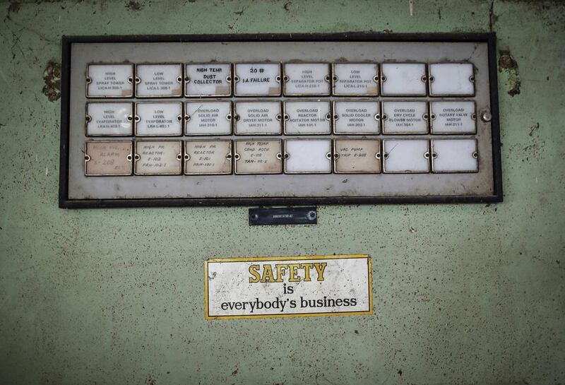 A sticker is seen next to a panel in the control room of the abandoned former Union Carbide Corp pesticide plant in Bhopal.