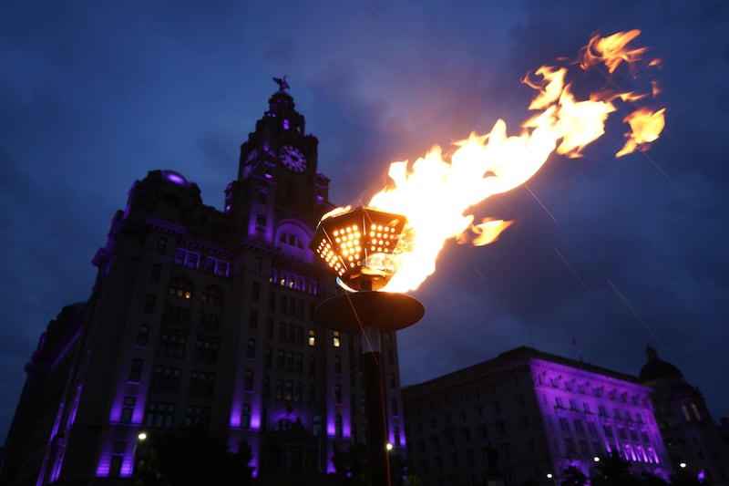 Platinum jubilee beacons are lit outside the Royal Liver Building, Liverpool, on day one of Queen Elizabeth II's platinum jubilee celebrations. PA