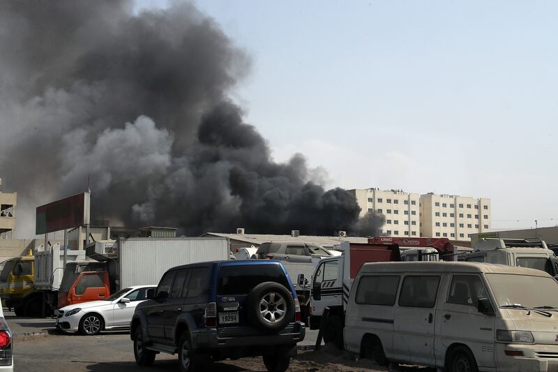 A fire broke out at a used car spare parts warehouse in Al Qusais Industrial Area 3 in Sharjah. All photos: Pawan Singh/The National.