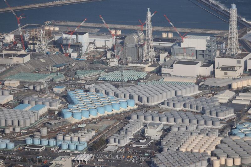 An aerial view of the TEPCO's Fukushima Daiichi Nuclear Power Plant  undergoing decommissioning work and tanks for storing treated water. AFP