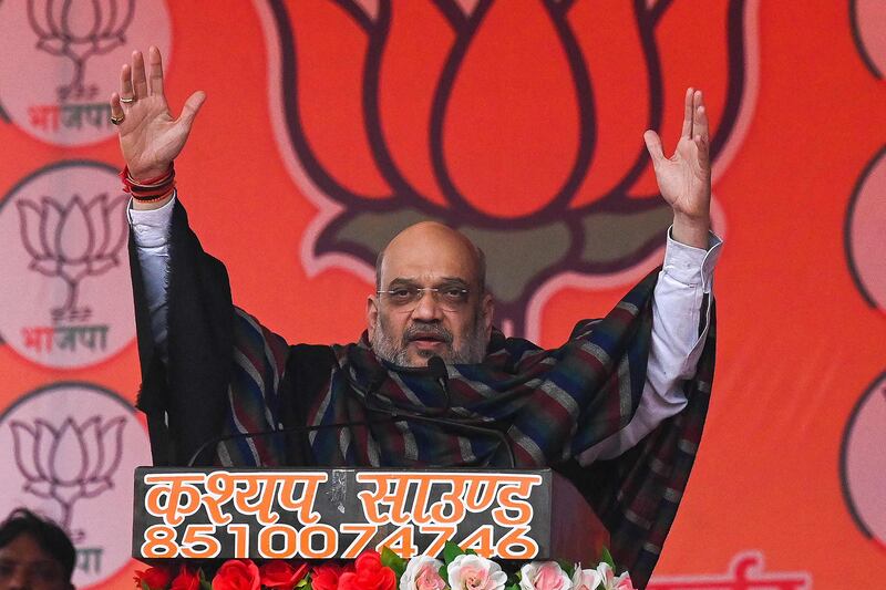 Interior Minister Amit Shah delivers a speech during an election rally in Loni, Uttar Pradesh. AFP