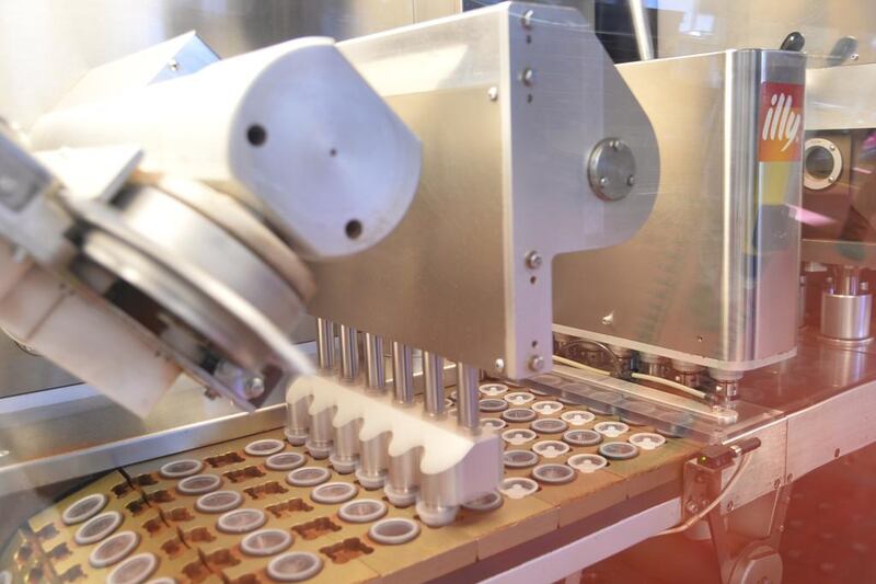 The production line of espresso capsules at the Illy caffe plant in Trieste. AFP