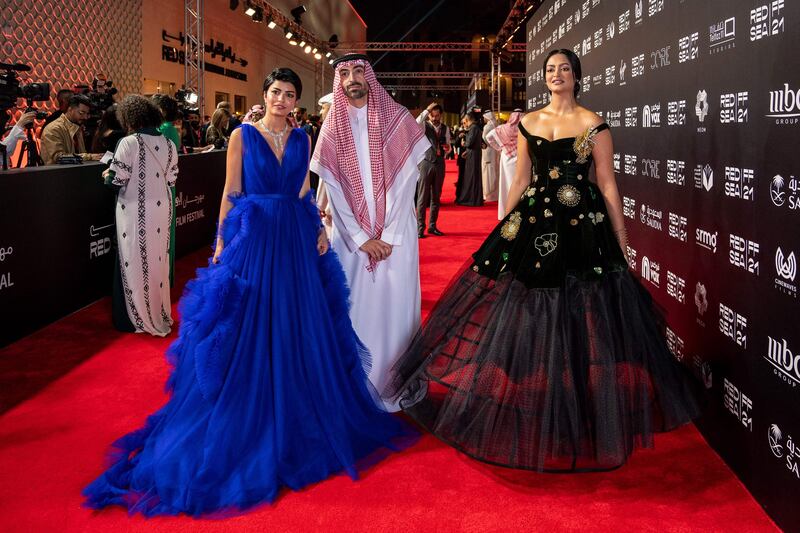 From left, Saudi actress Mila Al Zahrani and festival chairman Mohammed Al Turki with actress Fay Fouad. AFP