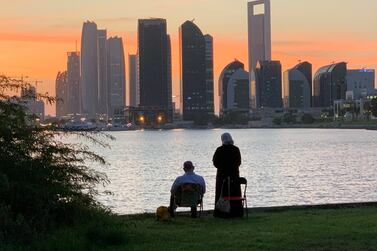 A sunset in Abu Dhabi. The UAE's clear rules have gone a long way to help the country deal with Covid-19. Victor Besa / The National