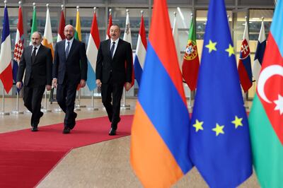 Armenian Prime Minister Nikol Pashinyan, European Council President Charles Michel and Azerbaijan President Ilham Aliyev arrive for a meeting in Brussels in April 2022. AFP