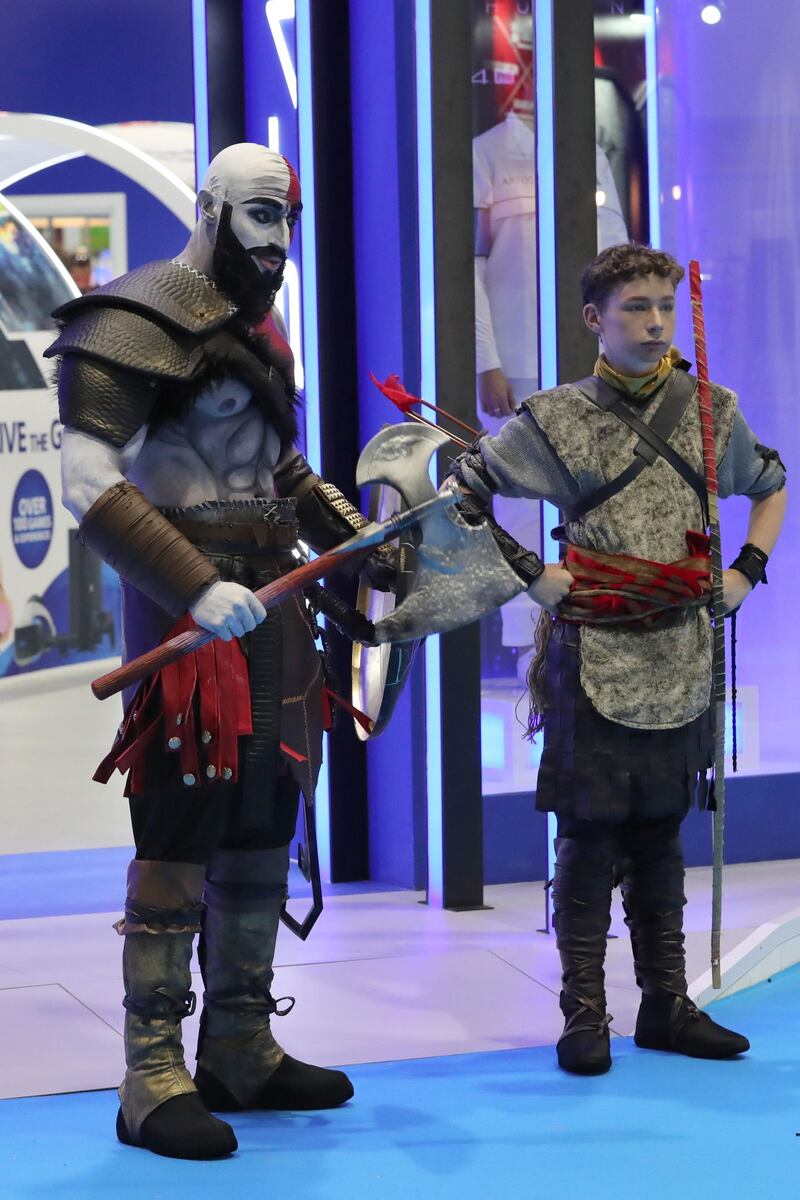 A man dressed as the comic book character Komandar Bloodshot (L). AFP / KARIM SAHIB